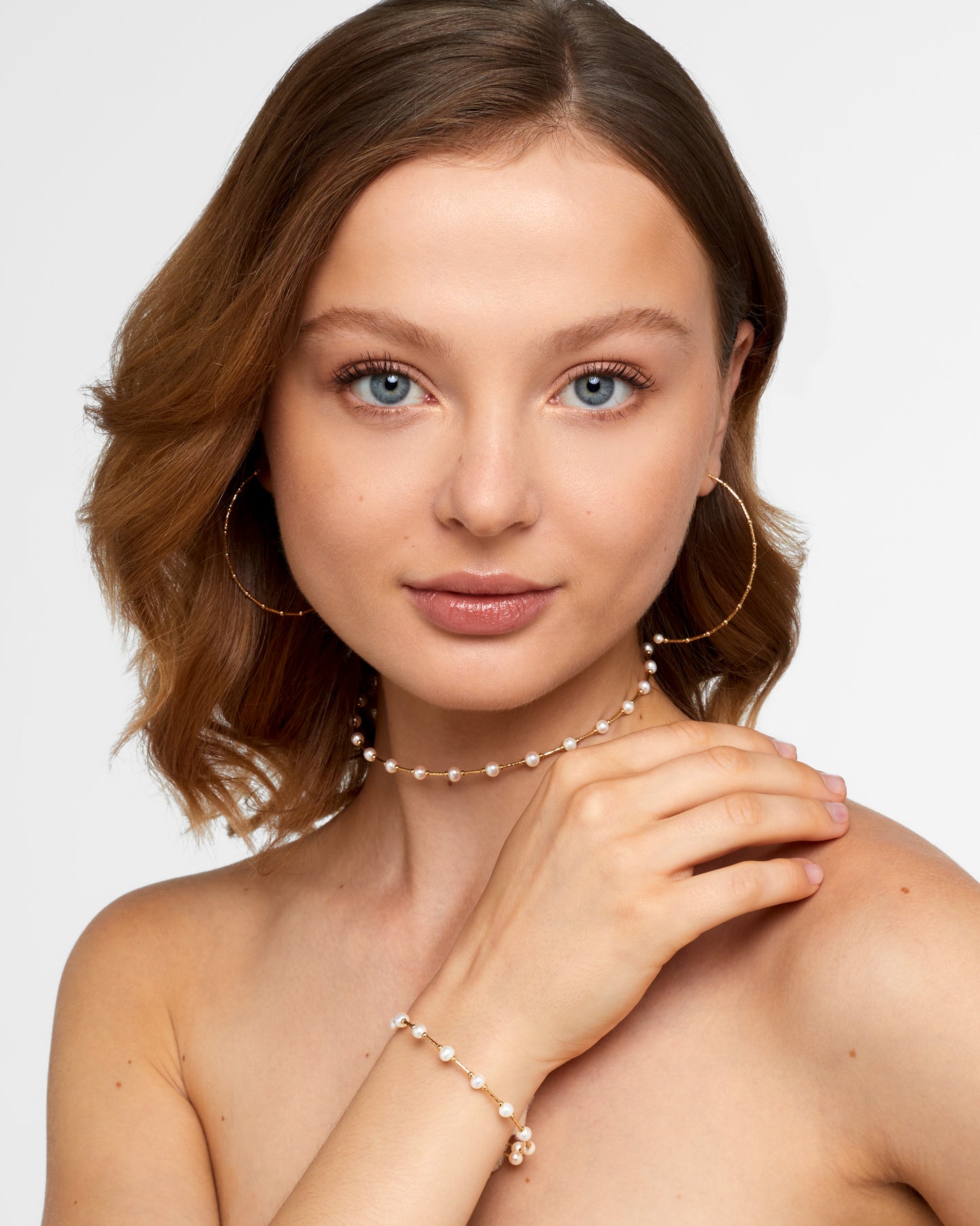 
                  
                    Sakura Gold Prism Small Pearl Hoops
                  
                